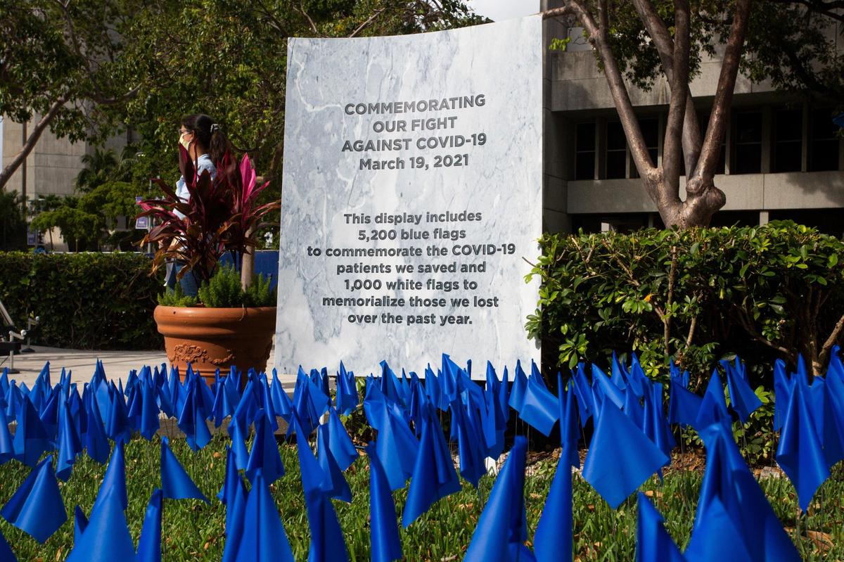 Jackson Health System honors healthcare workers and patients affected by the pandemic with an installment of 5,200 blue flags representing the lives saved and 1,000 white flags honoring the lives lost in the first year of the COVID-19 pandemic. The ceremony was held at Jackson Memorial Hospital in Miami, Florida, on Friday, March 19, 2021.