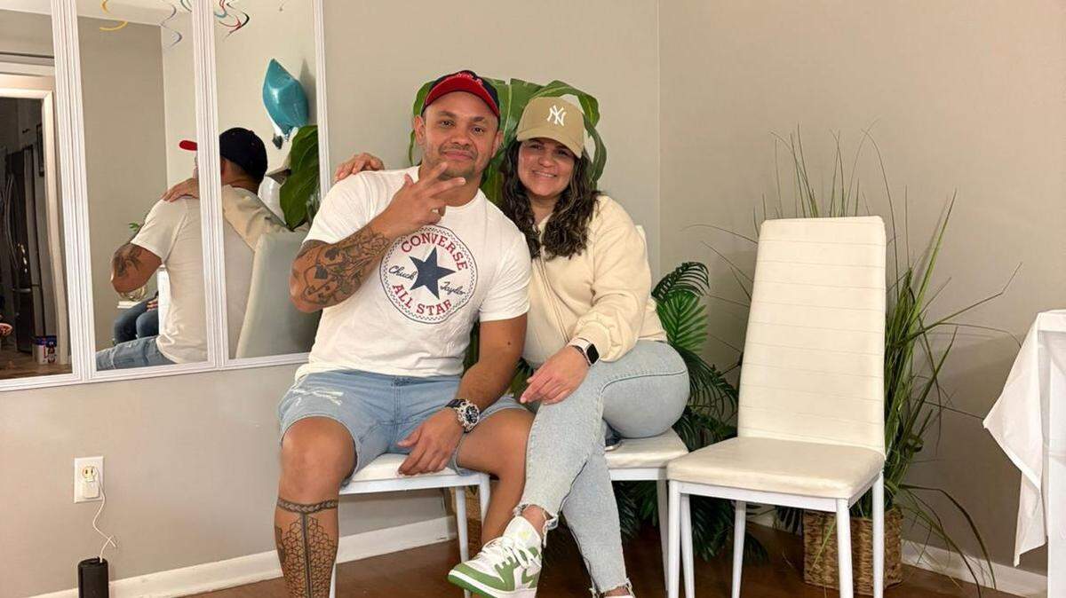 Jeferson Pacheco Cruces with his partner, Karina Pino, at their home in Tulsa, where they have been living since last year. Pacheco, a Venezuelan TPS holder, was detained during an immigration check just three days after a federal judge upheld deportation protections for Venezuelans.