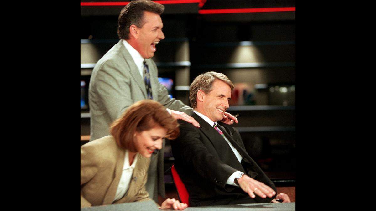 Tony Segreto, standing, with his colleagues.