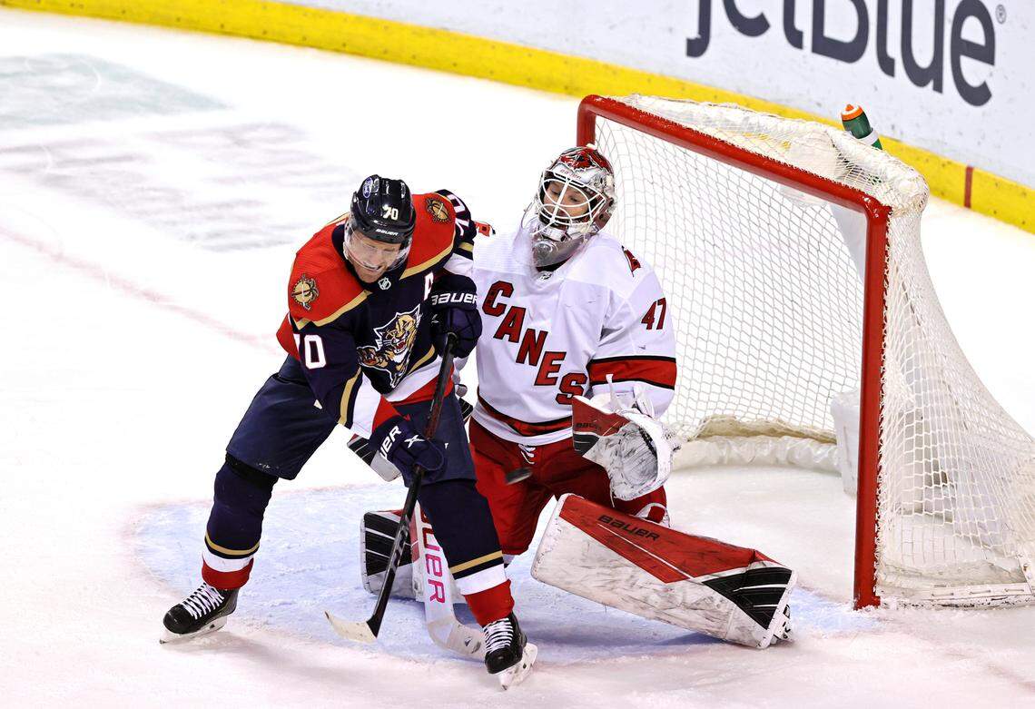 Florida Panthers right wing Patric Hornqvist (70) keeps his eyes on the puck as Carolina Hurricanes goalie James Reimer (47) makes the save during the second period of their NHL game at the BB&T Center on Saturday, February 27, 2021 in Sunrise, Fl.