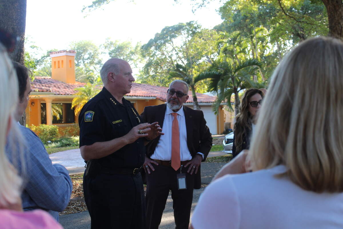 Coral Gables Police Chief Edward Hudak speaks to Italian Village residents in Coral Gables to discuss safety measures after Carrot the Cat’s death.