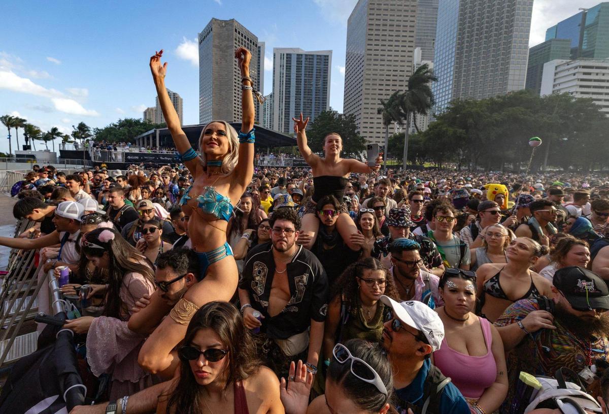 Carissa Lords, at left, reacts during performance by Subtronics during Ultra Music Festival’s 25th anniversary at Bayfront Park, in Miami, Florida, on Friday, March 28, 2025.