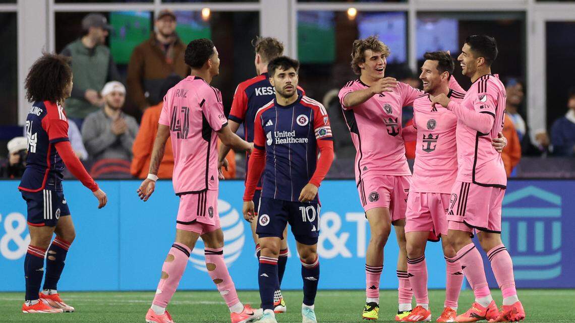 Apr 27, 2024; Foxborough, Massachusetts, USA; Inter Miami CF midfielder Benjamin Cremaschi (30) and forward Luis Suarez (9) and midfielder Lionel Messi (10) and midfielder David Ruiz (41) celebrate after a goal as New England Revolution forward Carles Gil (10) walks away in the second half at Gillette Stadium. Mandatory Credit: Paul Rutherford-USA TODAY Sports