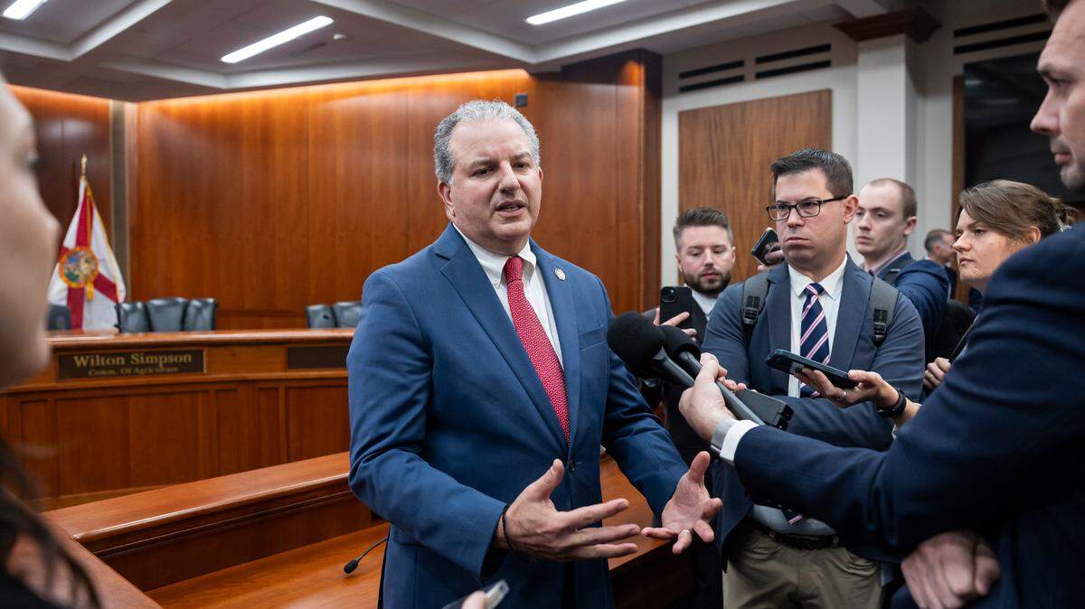 Florida Chief Financial Officer Jimmy Patronis speaks to reporters after a Florida Cabinet meeting at the Capitol on March 4, 2025, in Tallahassee.