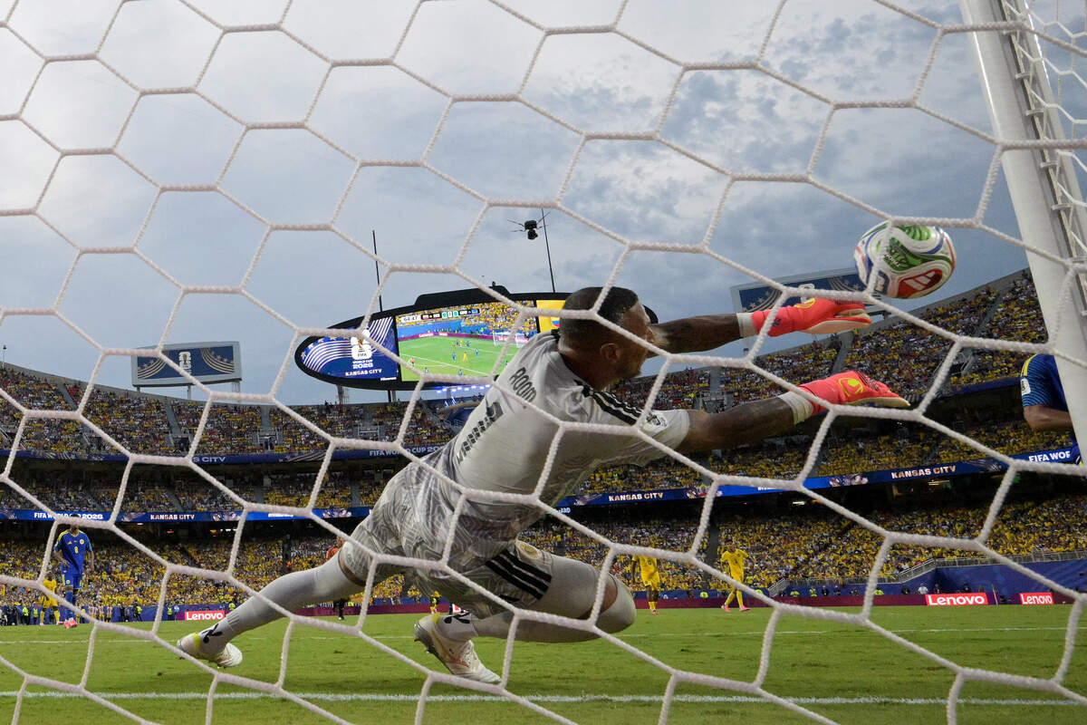 TOPSHOT - Curacao's goalkeeper #01 Eloy Room makes a save during the 2026 World Cup Group E football match between Ecuador and Curacao at the Kansas City Stadium in Kansas City on June 20, 2026.  (Photo by JUAN MABROMATA / AFP via Getty Images)