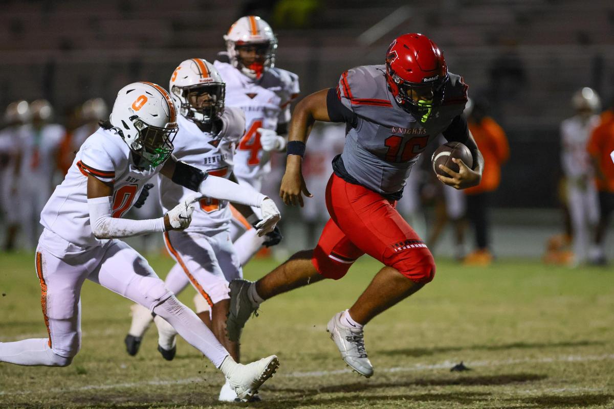 Monarch Knights quarterback Florentino Lopez (16) runs with the football for a touchdown against the Piper Bengals during the first quarter of a high school football game at Don Conkel Stadium at Coconut Creek High School in Coconut Creek, Florida, Thursday, October 24, 2024.