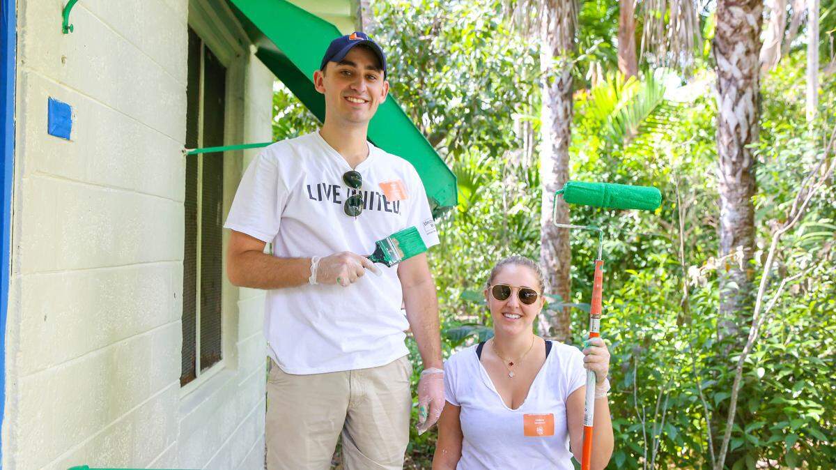 United Way volunteers Ethan Creo and Lindsey Mendelson helped paint cabins at the Girl Scouts’ Camp Mahachee through community service for Martin Luther King Jr. Day.