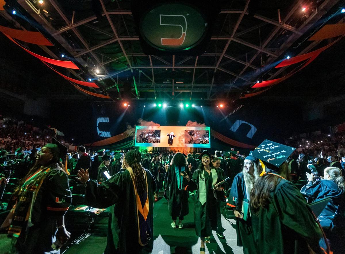 Graduates leave the floor at the University of Miami’s Watsco Center in Coral Gables after a spring commencement ceremony on Friday morning, May 12, 2023.
