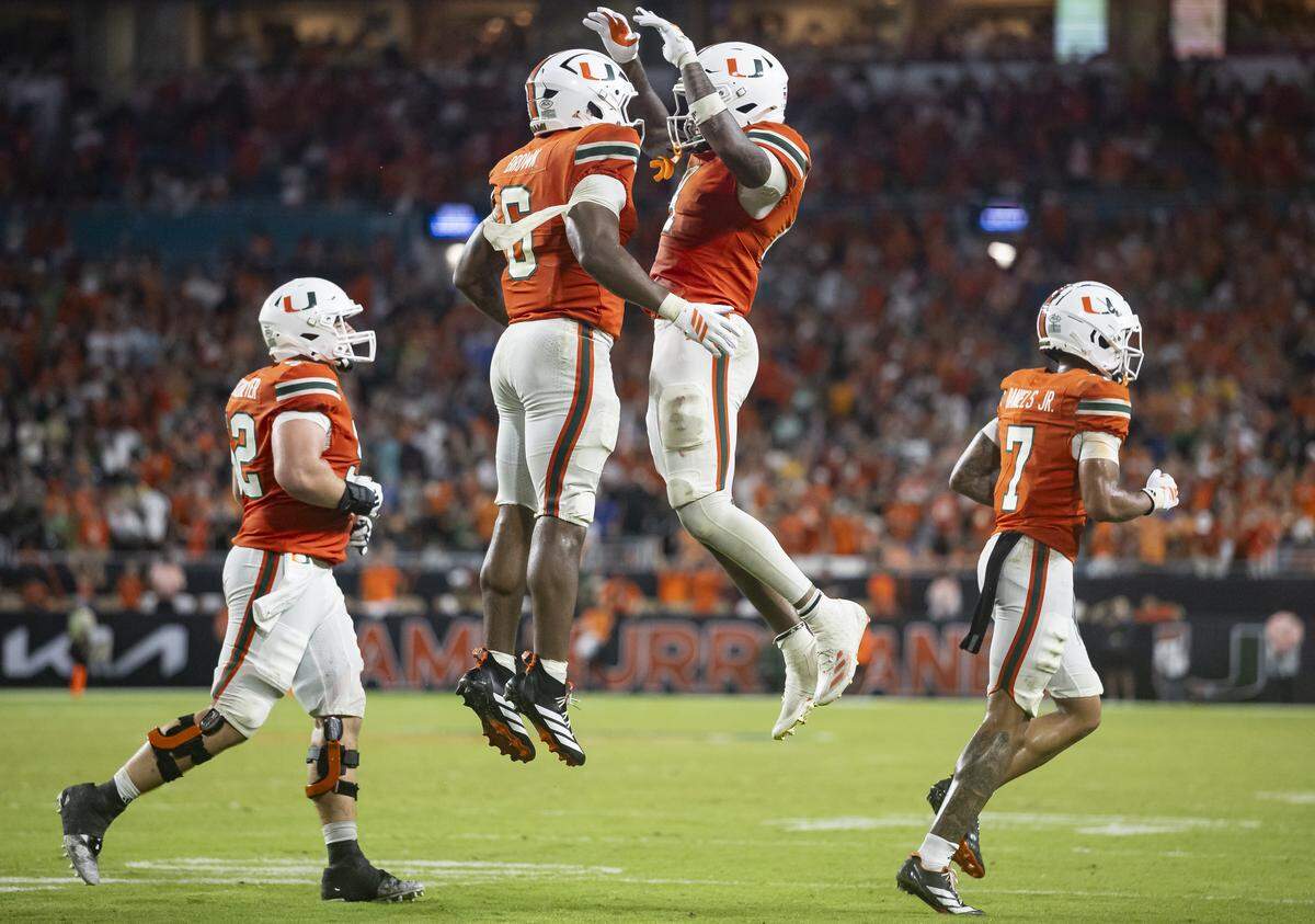 Miami Hurricanes running back CharMar “Marty” Brown (6) celebrates after scoring a touchdown against the Notre Dame Fighting Irish in the second half of their NCAA football game at Hard Rock Stadium on Sunday, Aug. 31, 2025, in Miami Gardens, Fla.