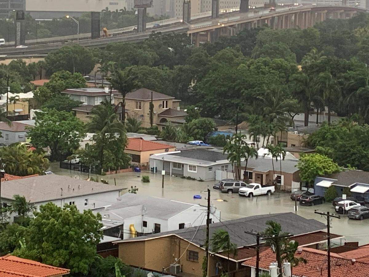 Water laps at homes in the neighborhood of the 700 block of Northwest W 17th Court in Miami Saturday morning, June 4, 2022, from a disturbance heading toward Florida’s west coast.