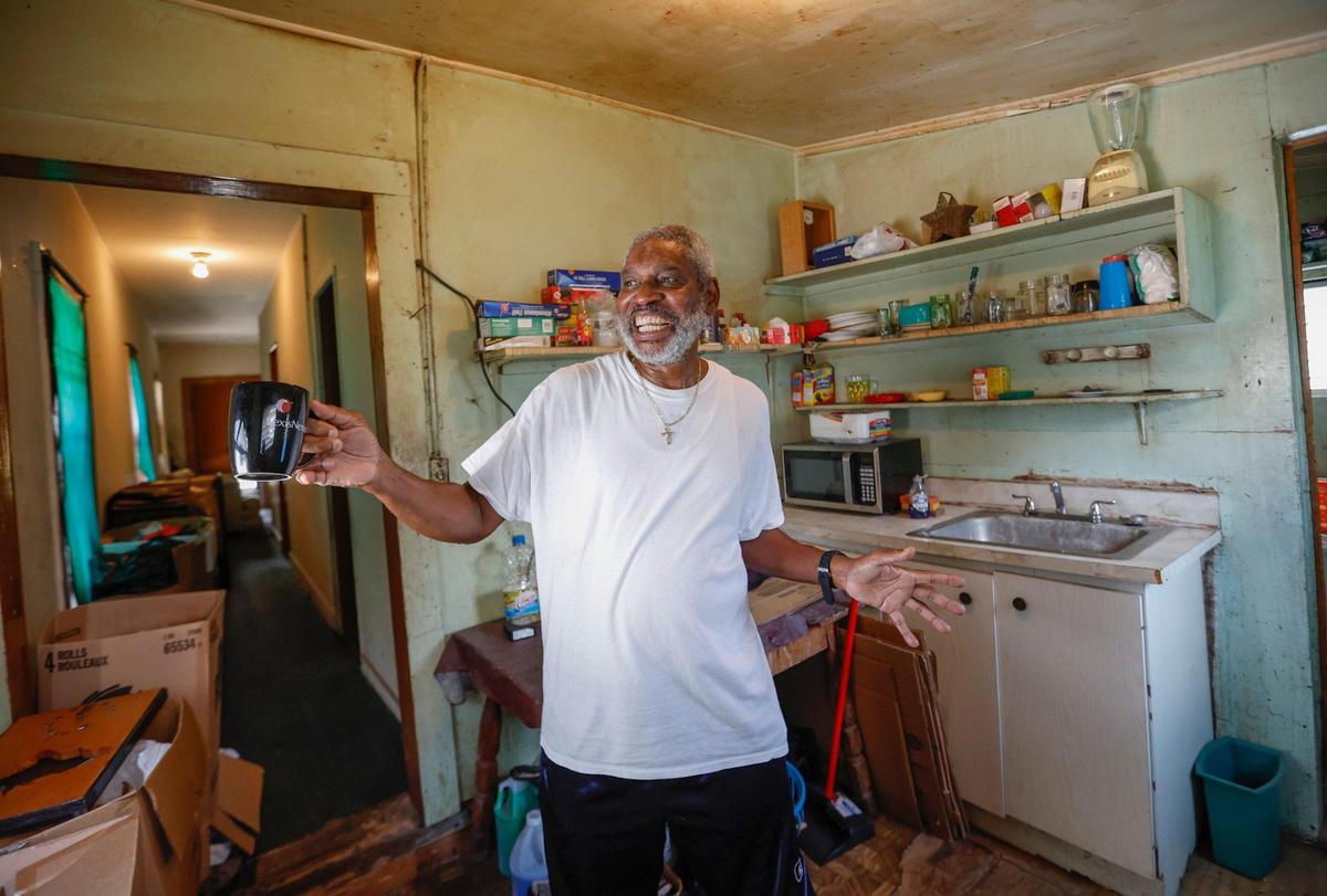 Charles Cratit, 69, has lived in his cottage at 4614 Brooker Street since he was a child. Cratit welcomes investor Fabio Riberio’s plans to renovate and preserve the houses in Coral Gables’ MacFarlane historic district.