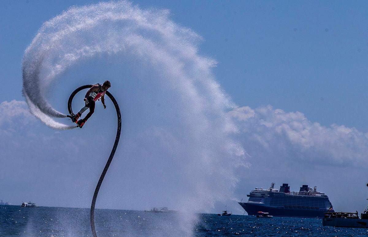 Members of the Free Style Connection Team perform a flyboard demonstration during the Hyundai Air & Sea Show in 2021.