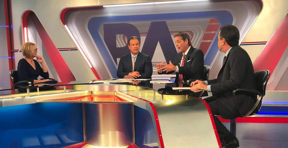 Carlos Garin, second from right, uses his hands to make a point during a taping of 'Preparen Apunten Voten' on América TeVé on Wednesday, May 9, 2018. He is a candidate for District 5 on the Miami-Dade County Commission. Two other candidates are in the studio with him: Eileen Higgins, left, and Alex Diaz de la Portilla, right. The moderator is Felix Guillermo. A fourth candidate, Zoraida Barreiro, did not attend the debate.