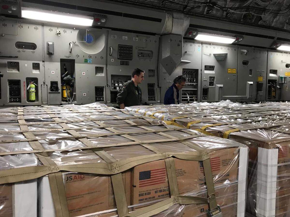A U.S. flight filled with humanitarian aid for Venezuelans takes off from Miami from an air base in Homestead on Saturday morning.