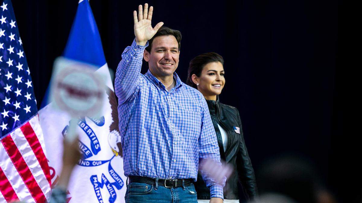 Republican presidential candidate Florida Gov. Ron DeSantis, left, and his wife, Casey DeSantis, are introduced during the annual Roast and Ride fundraiser for U.S. Sen. Joni Ernst, Saturday, June 3, 2023, at the Iowa State Fairgrounds in Des Moines, Iowa.