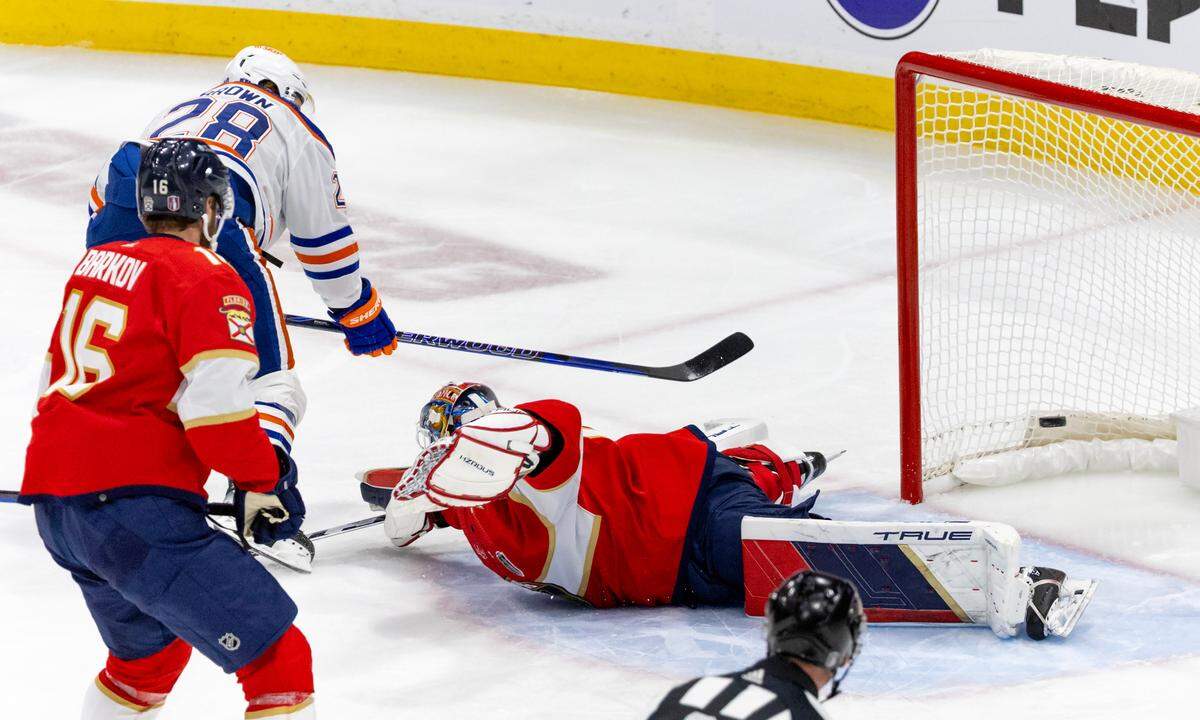 Edmonton Oilers right wing Connor Brown (28) scores a goal against Florida Panthers goaltender Sergei Bobrovsky (72) during the first period of Game 5 of the NHL Stanley Cup Final at the Amerant Bank Arena on Tuesday, June 18, 2024, in Sunrise, Fla.