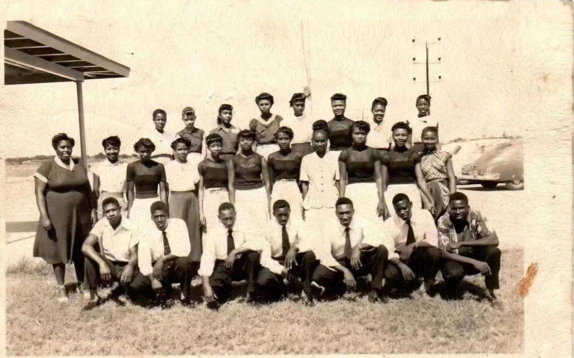Attucks High School first graduation class of 1952 courtesy of Earl Garnet Beneby Attucks Alumni class of 1965. Actor Wood Harris’ father is pictured on the third row, bottom left.