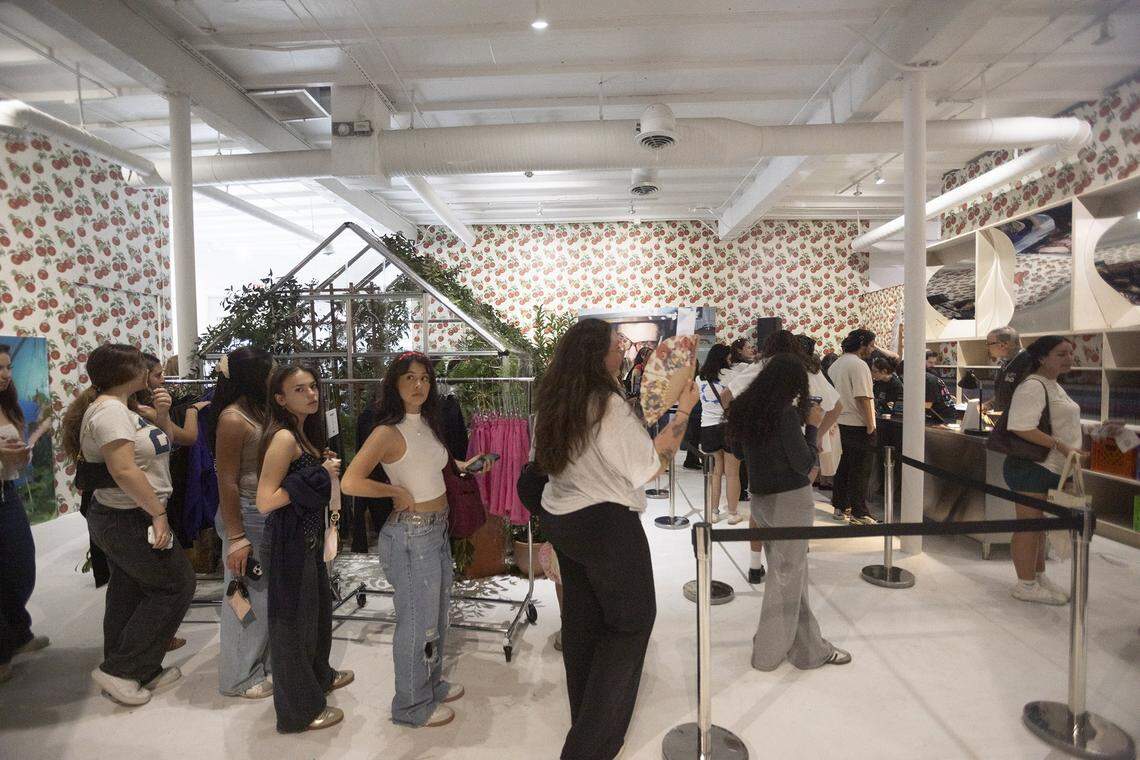 Fans wait in line to pay for merchandise at a pop-up shop celebrating the release of Harry's House and the upcoming tour by Harry Styles in the Wynwood neighborhood of Miami on Friday, March 6, 2026. The temporary shop features exclusive merchandise, album displays and themed installations tied to the singer's latest release and tour.