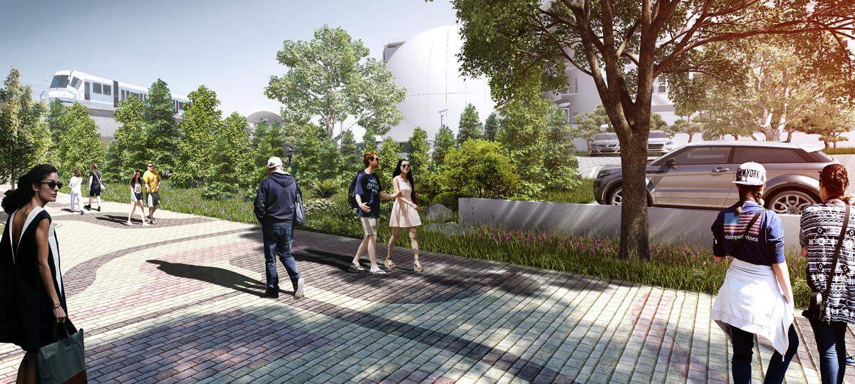 An architectural rendering shows how the Frost Museum of Science, seen here in the background, plans to turn an unsightly vacant parcel in front of its home on Biscayne Boulevard into a green, landscaped temporary parking lot. The half-acre lot, which the Frost is responsible for under a lease with the city, is earmarked for future museum expansion.