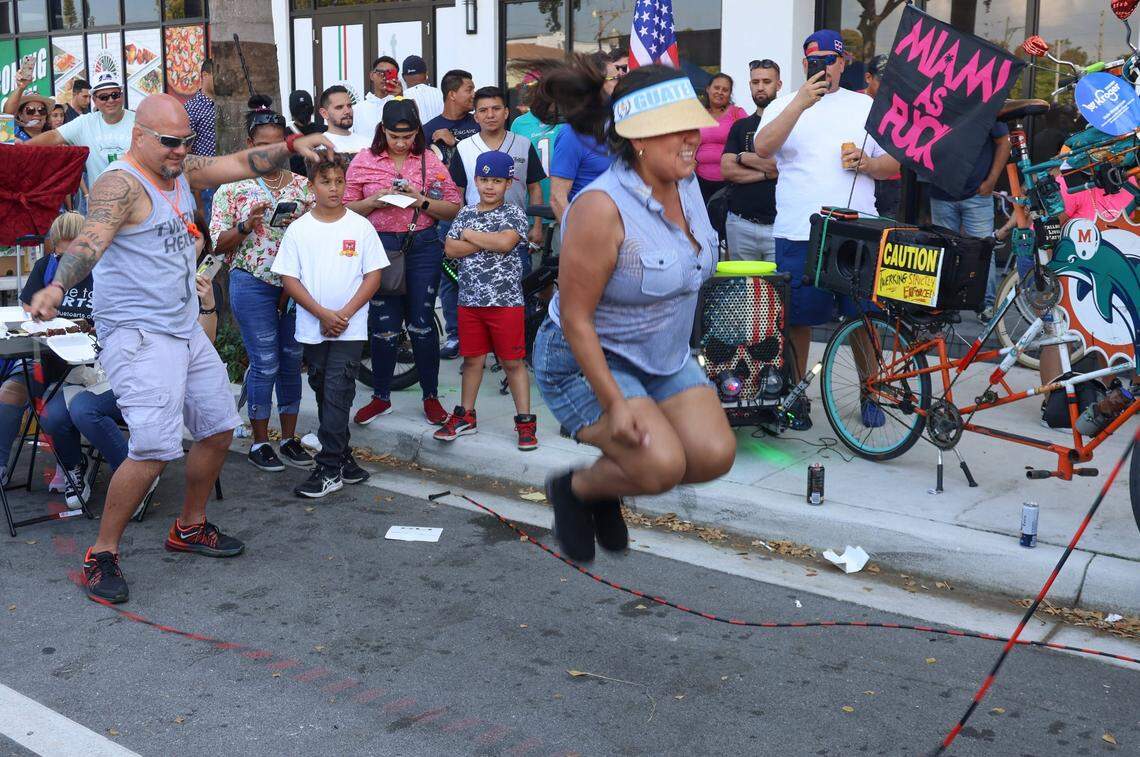 Silvia Aguilar, 45, jumps rope to Latin music during the Calle Ocho Music Festival, the largest Latin music festival in the nation, on Sunday, March 12, 2023.