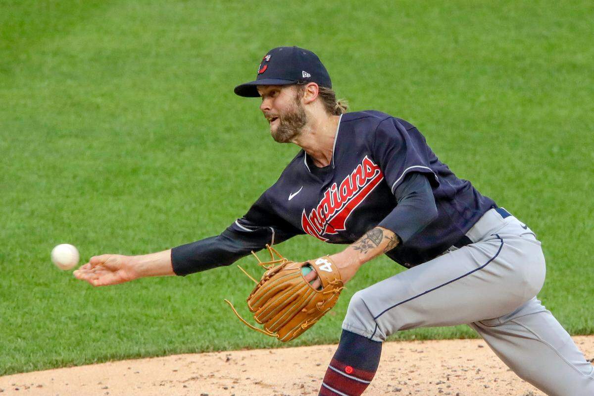 In this July 22, 2020, file photo, Cleveland Indians relief pitcher Adam Cimber delivers during the first inning of an exhibition baseball game against the Pittsburgh Pirates in Pittsburgh. The Indians traded Cimber to the Miami Marlins on Monday, Nov. 3, 2020, for $100,000.