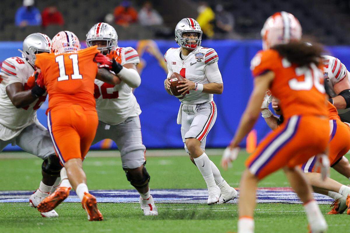 NEW ORLEANS, LOUISIANA - JANUARY 01: Justin Fields #1 of the Ohio State Buckeyes drops back against the Clemson Tigers in the first half during the College Football Playoff semifinal game at the Allstate Sugar Bowl at Mercedes-Benz Superdome on January 01, 2021 in New Orleans, Louisiana. (Photo by Kevin C. Cox/Getty Images)