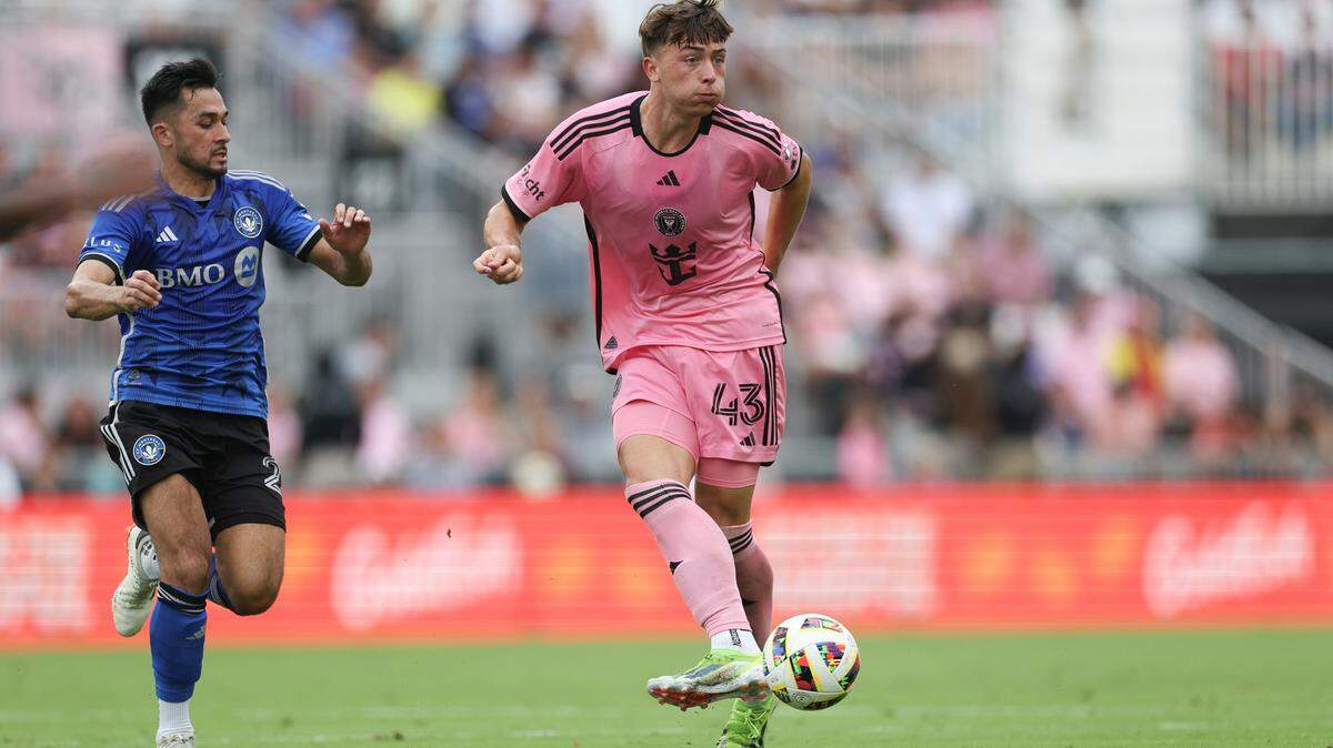 Mar 10, 2024; Fort Lauderdale, Florida, USA; Inter Miami CF midfielder Lawson Sunderland (43) passes the ball as CF Montreal midfielder Mathieu Choiniere (29) defends during the second half at Chase Stadium. Mandatory Credit: Nathan Ray Seebeck-USA TODAY Sports