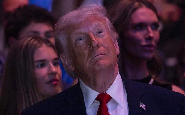 President Donald Trump attends UFC 327 at the Kaseya Center on Saturday, April 11, 2026, in downtown Miami, Fla.