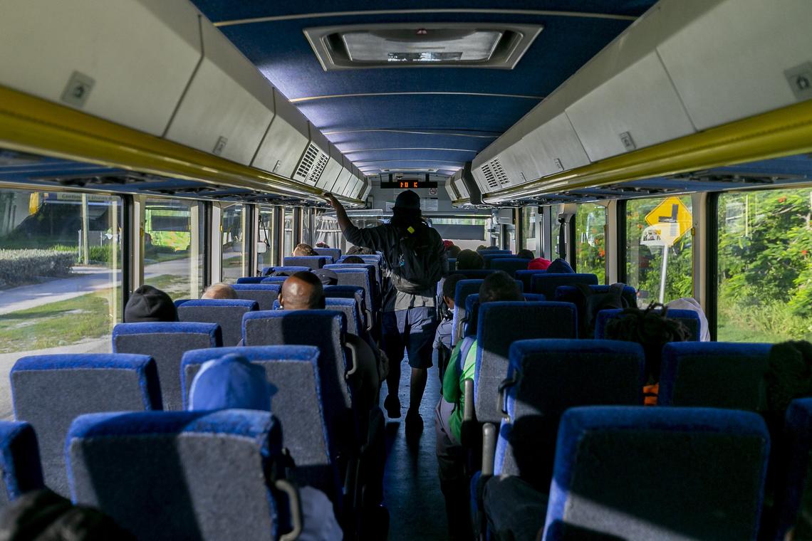Passengers ride the Dade-Monroe Express bus as it makes its way down to Marathon, Florida, on Aug. 27, 2019.