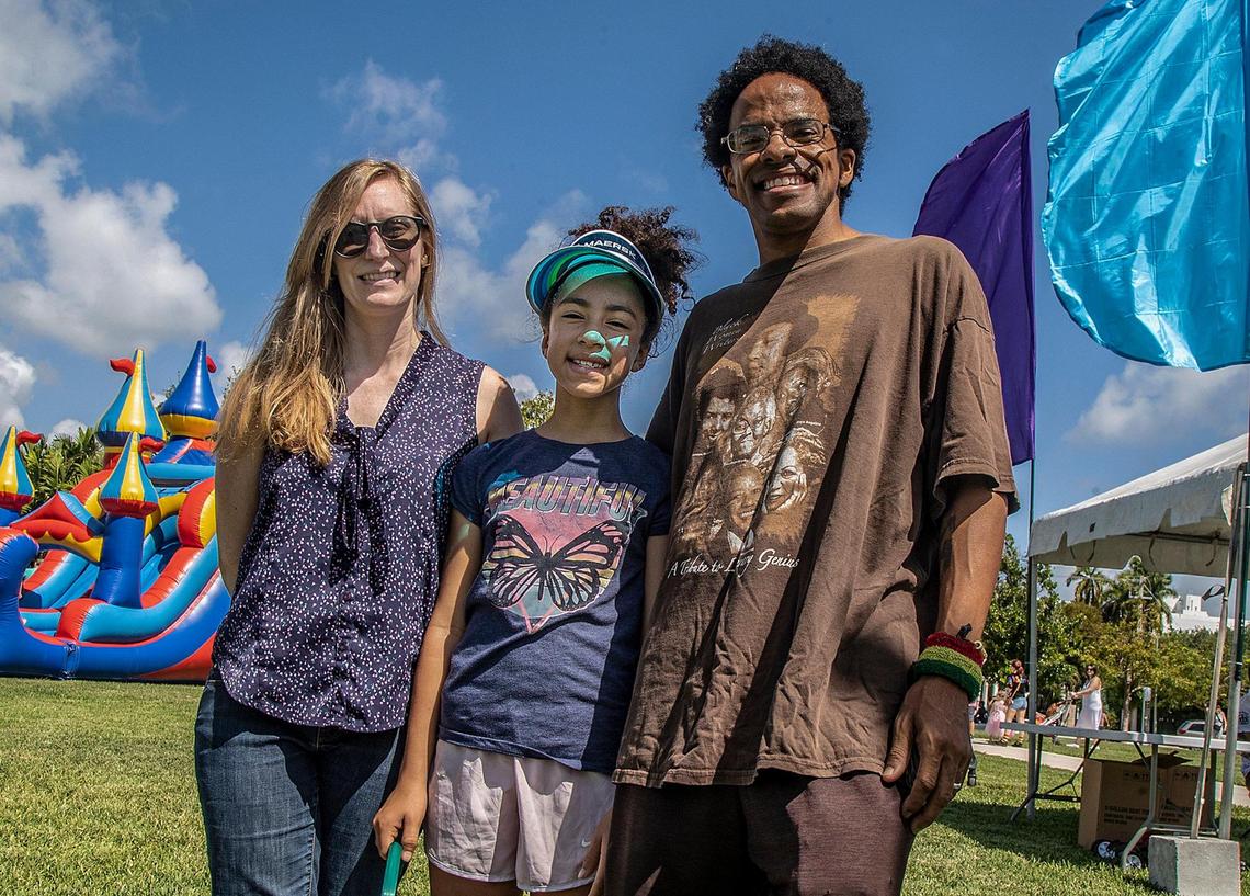Erin and Rob Collins with their daughter Teya, enjoy the outdoors at the Easter Family Picnic celebration part of the Miami Beach Pride Festival at Pride Park, on Saturday April 8, 2023.