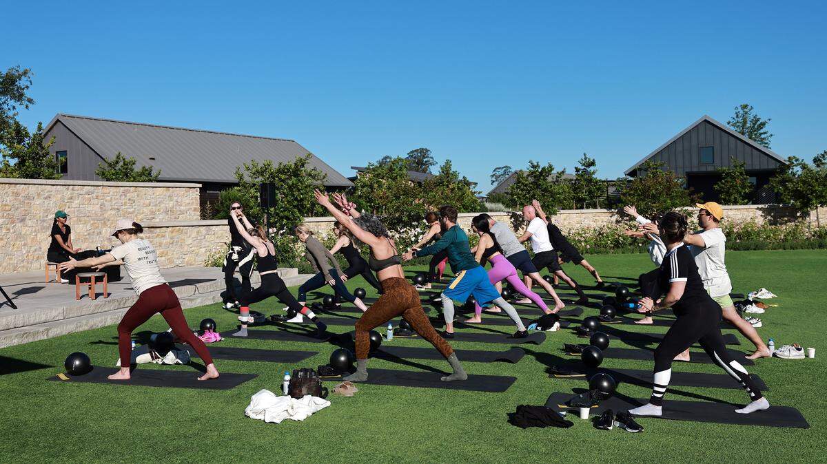 Guests participate in Pilates with Kirsten King during the Business of Beauty Global Forum 2024 at Stanly Ranch on June 04, 2024 in Napa, California.