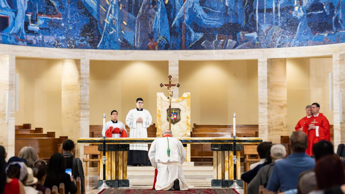 Miami Archbishop Thomas Wenski prays during a Good Friday service at the Cathedral of St. Mary on April 18, 2025, in Miami.