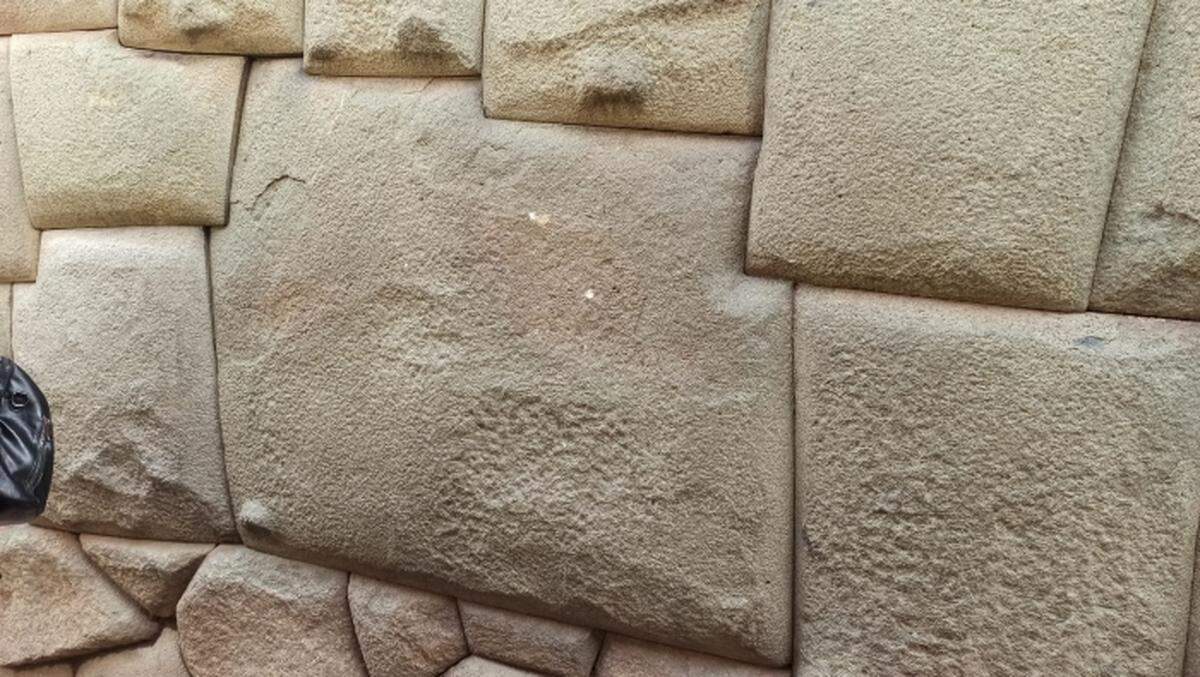 The stones are famous for fitting perfectly together with no mortar or concrete, as built by the Inca.