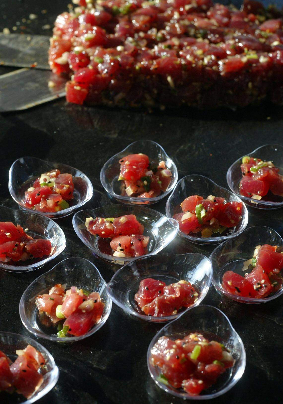 In 2006, tuna for the sampling at the booth of Wynn Las Vegas Catering and Special Events at the  South Beach Wine & Food Festival.