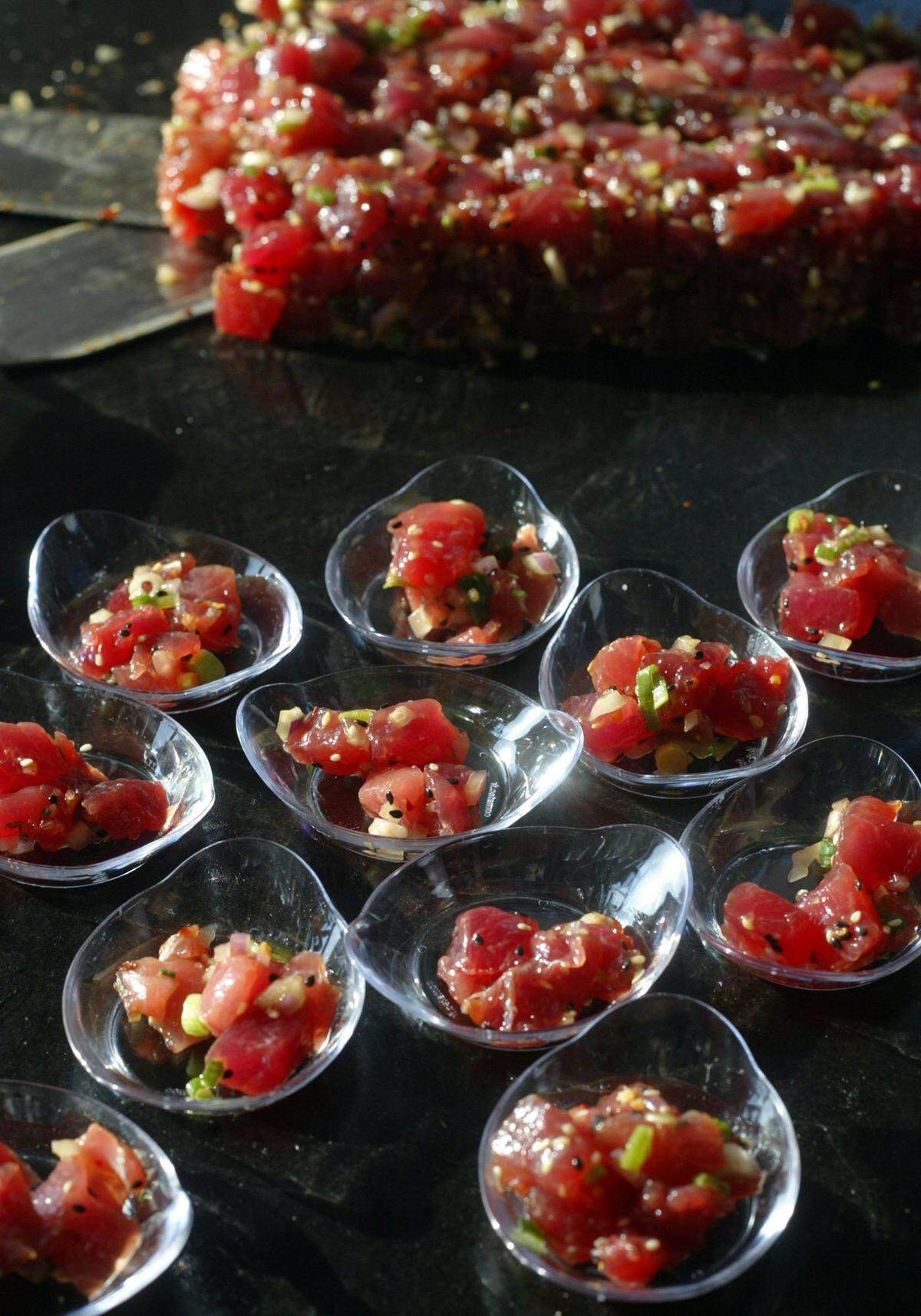 In 2006, tuna for the sampling at the booth of Wynn Las Vegas Catering and Special Events at the South Beach Wine & Food Festival.