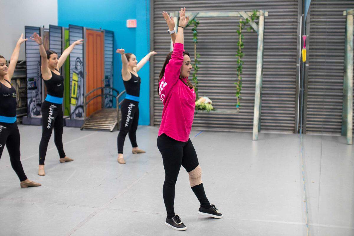 Ascendance Studio co-owner Valentina Bagala, front, instructs clients Isabela Sarreiro, Maryangel Chacin and Paulina Texier.