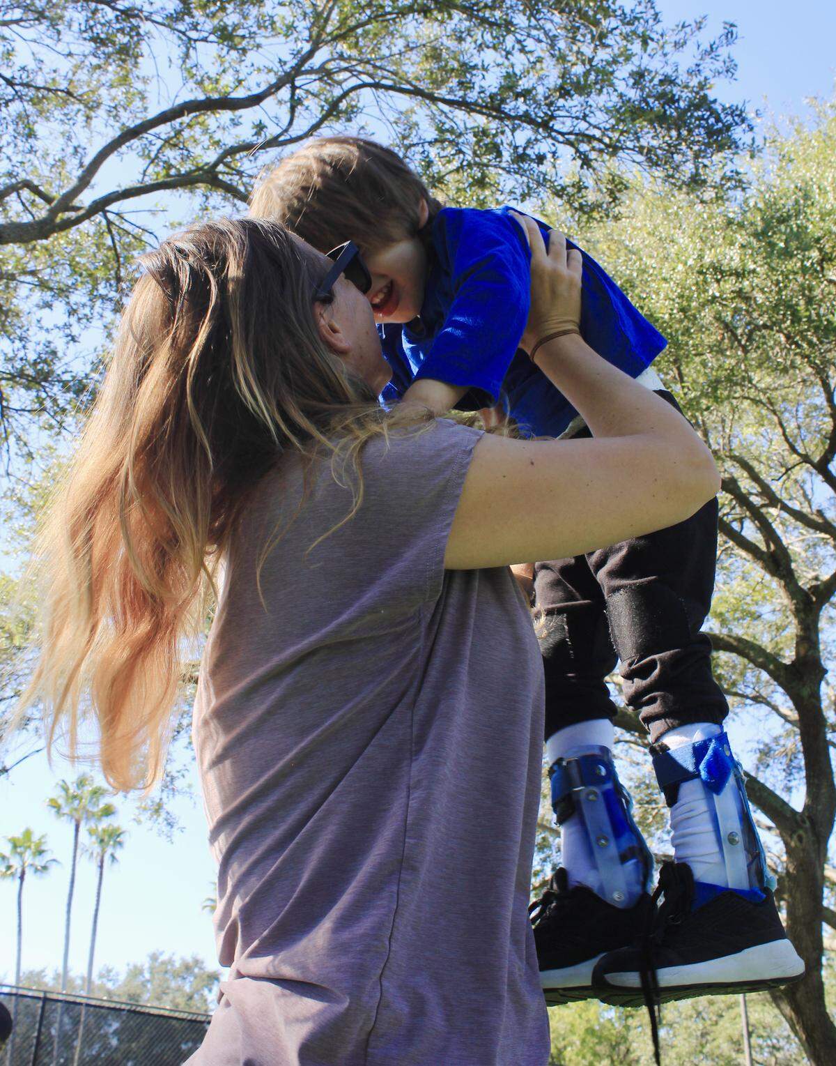 Elizabeth Rodriguez and her son Mason play in Cypress Park in Coral Springs.  