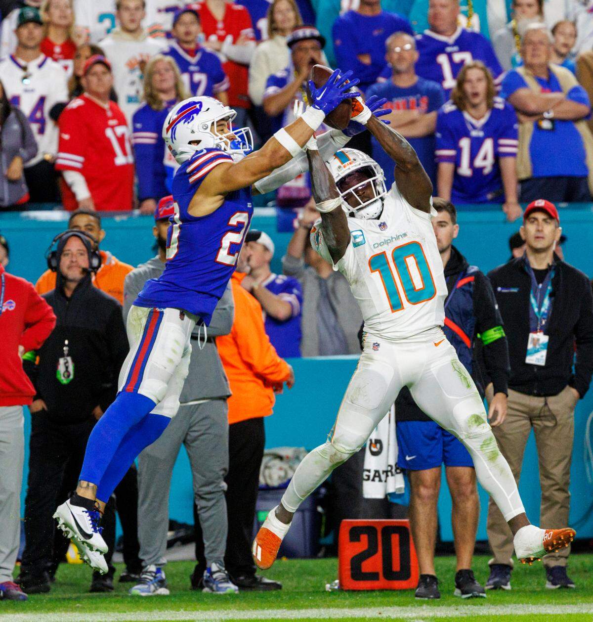 Buffalo Bills safety Taylor Rapp (20) breaks a pass intended to Miami Dolphins wide receiver Tyreek Hill (10) during second half of an NFL football game at Hard Rock Stadium on Sunday, Jan. 7, 2024 in Miami Gardens, Fl.