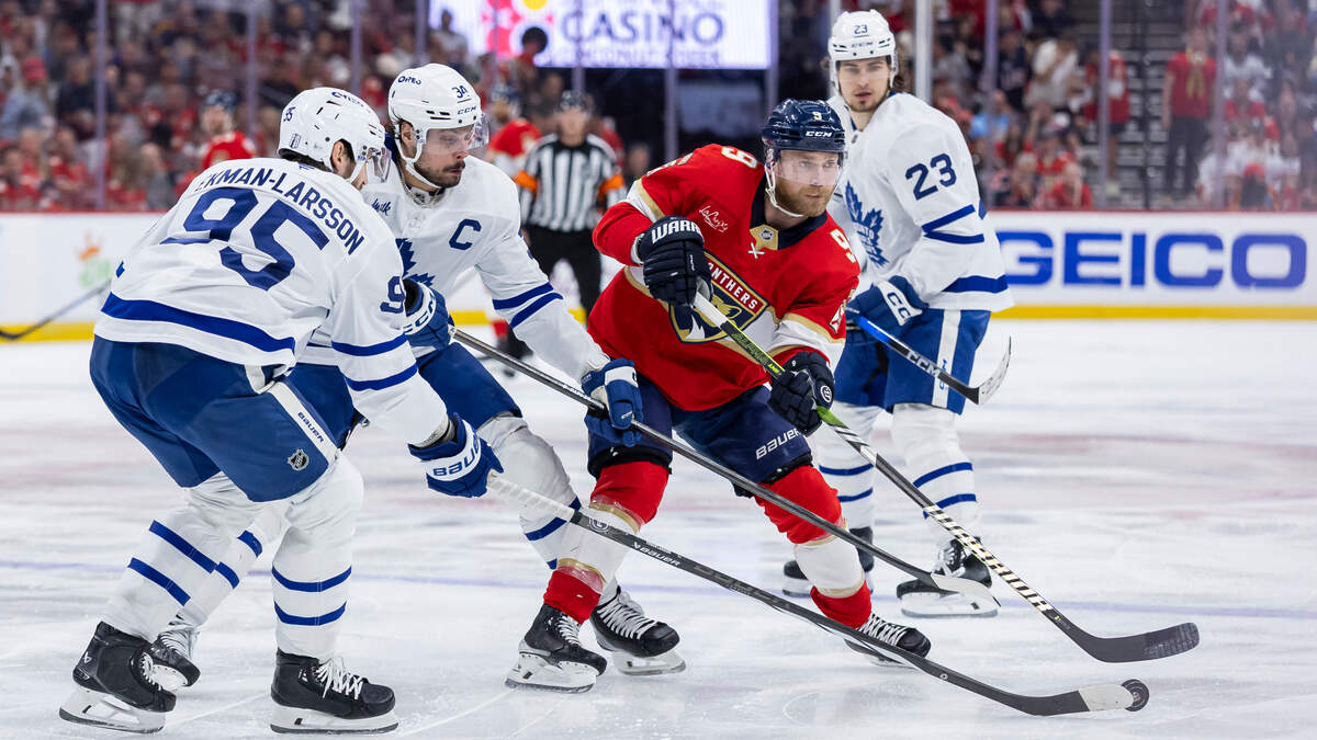 Florida Panthers center Sam Bennett (9) skates with the puck as Toronto Maple Leafs center Auston Matthews (34) and defenseman Oliver Ekman-Larsson (95) defend in the third period of Game 6 of a second-round Stanley Cup playoffs series at the Amerant Bank Arena on Friday, May 16, 2025, in Sunrise, Fla.
