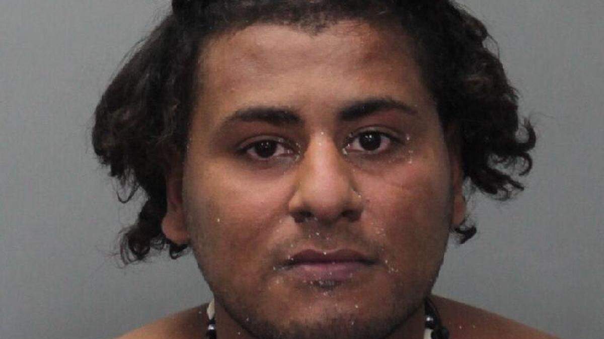 Police said Raul Martinez, 31, crashed a party on the sands of Miami Beach Wednesday night, then fought with guests and police before he was subdued.
