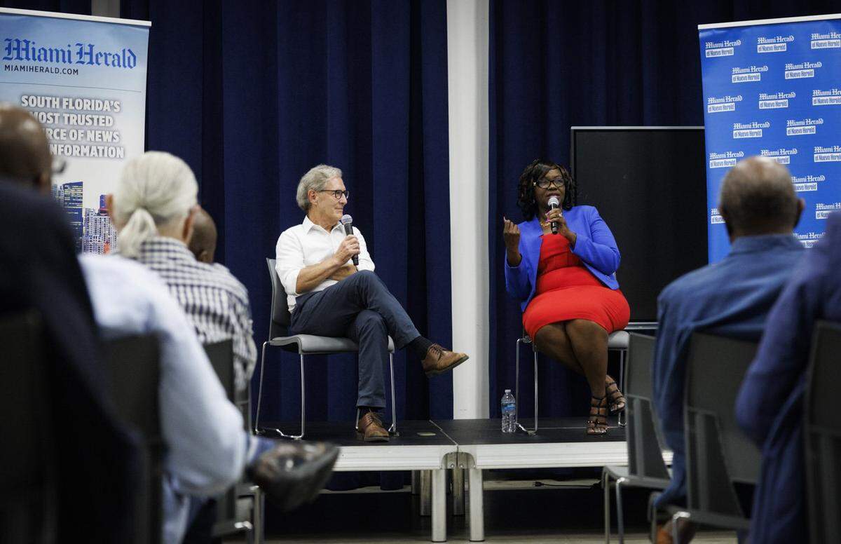 Jacqueline Charles, Haiti and Caribbean correspondent for the Miami Herald, right, speaks to the community during an interview with Jay Weaver, Miami Herald editor, left, about Haiti’s past and future during An Evening with Jacqueline Charles on May 30, 2024, at African Heritage Cultural Arts in Miami.