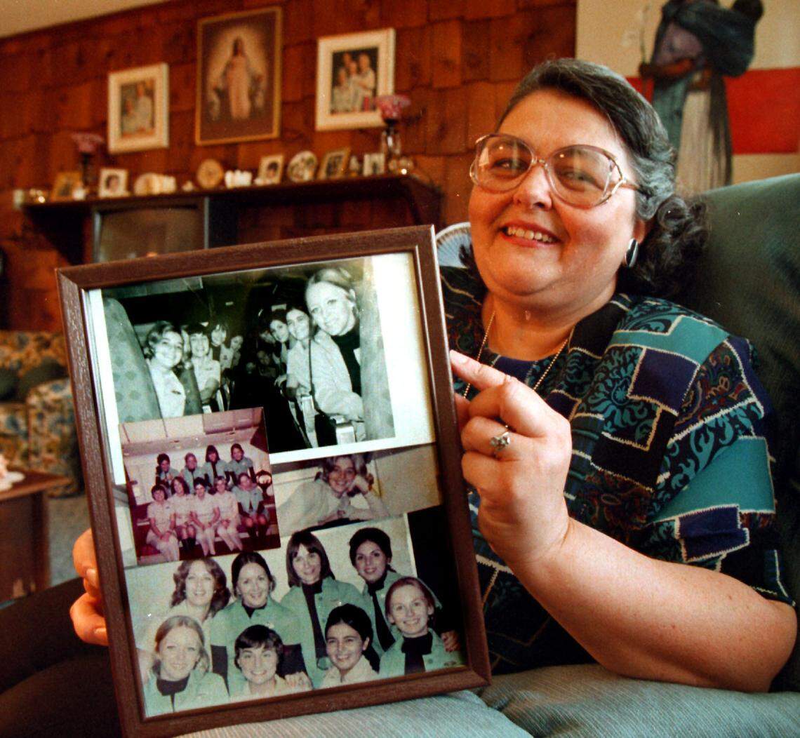 FOR DESIGN LIVING 5/18/96 Photo by Joe RImkus Jr MHS...Beverly Raposa,flight attendant on Eastern Flight 401.Here she has photos of the some of the crew that was on that flight.