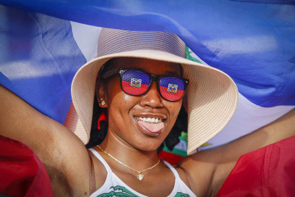 Kelsy Ti reacts during the 28th Annual Haitian Compas Festival at The NoMI Village celebrating Haitian Flag Day, in North Miami, Florida  on Saturday, May 16, 2026.