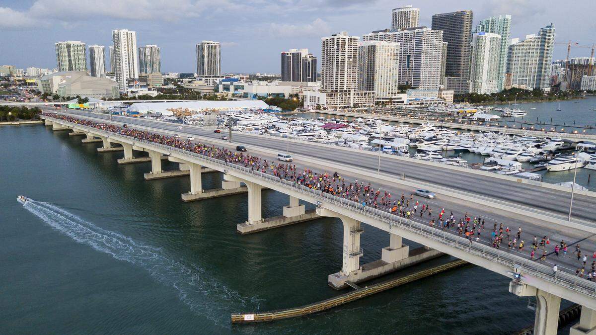 An aerial view of downtown Miami shows runners making their way toward Watson Island from downtown Miami as they participate in the 18th annual Life Time Miami Marathon and Half Marathon on Sunday, February 9, 2020. There were more than 20,000 combined runners registered for the marathon and half marathon.