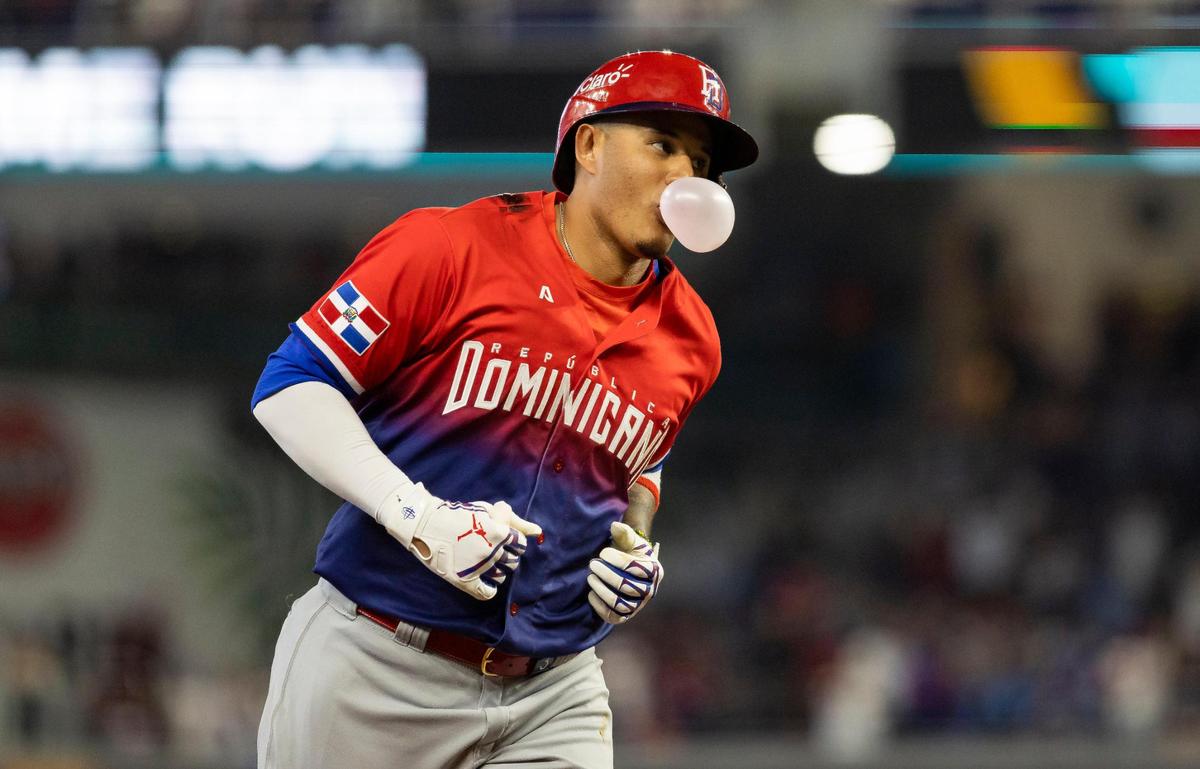 Dominican Republic third baseman Manny Machado (13) runs the bases after hitting a home run against Nicaragua during the seventh inning of a Pool D game at the World Baseball Classic at loanDepot Park on Monday, March 13, 2023, in Miami, Fla.