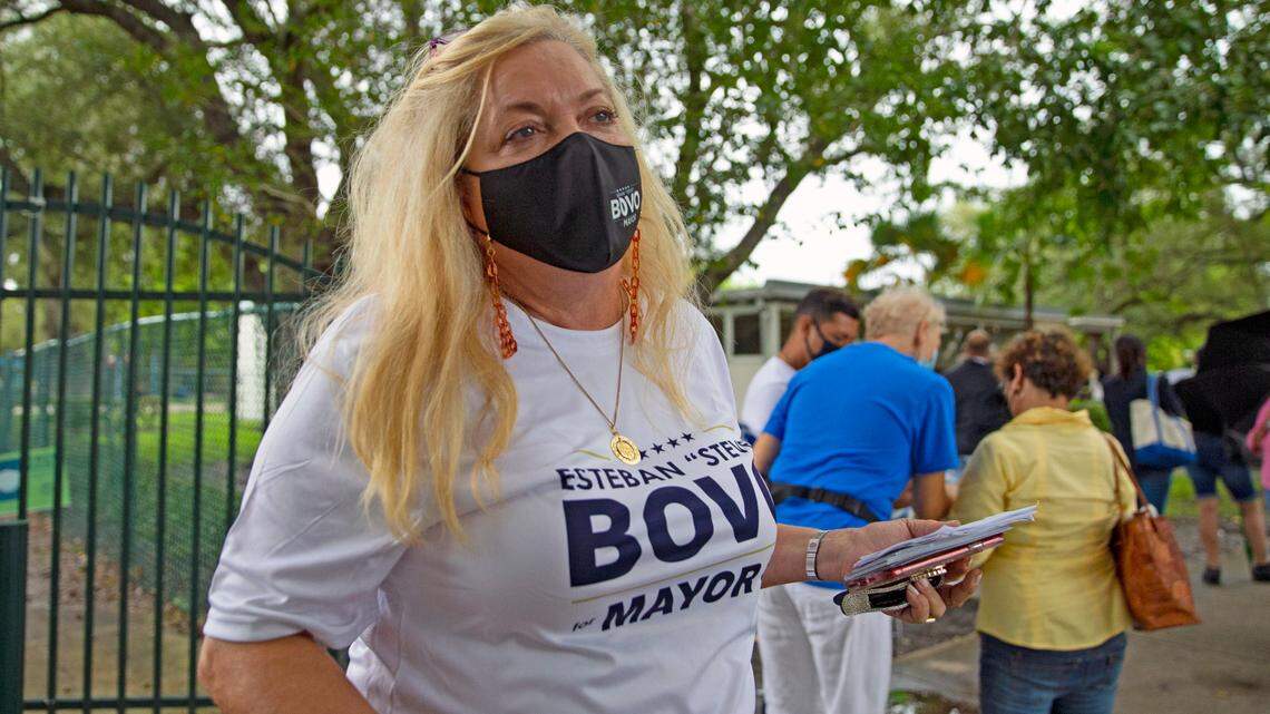 Miami-Dade resident and President Donald J. Trump supporter Alina Garcia talks to el Nuevo Herald reporter Mario Penton on first day of early voting for the general election at Shenandoah Branch Library located at 2111 SW 19th St. on Monday, October 19, 2020, in Miami, Florida.