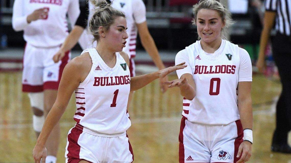 Haley Cavinder (left) and twin sister Hanna (right) announced they are transferring from Fresno State to the University of Miami. They are social media sensations with four million TikTok followers and 800,000 Instagram followers.