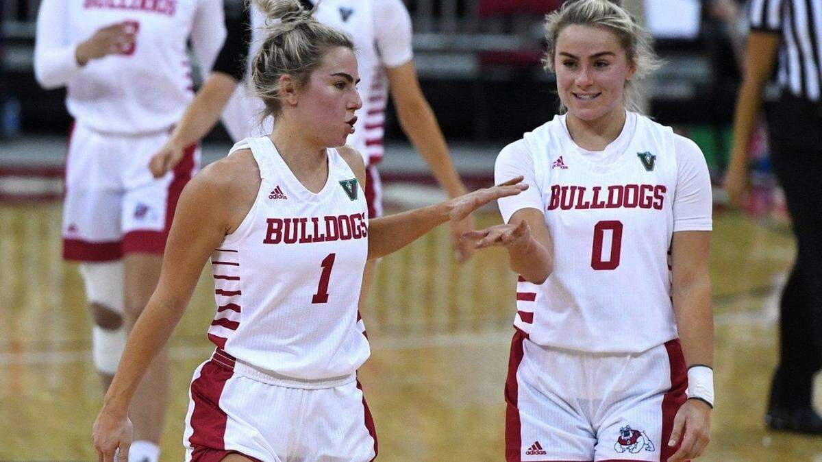Haley Cavinder (left) and twin sister Hanna (right) announced they are transferring from Fresno State to the University of Miami. They are social media sensations with four million TikTok followers and 800,000 Instagram followers.