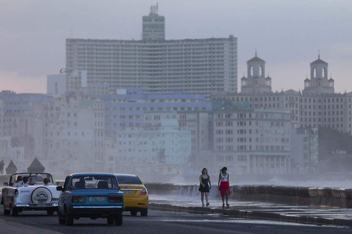 During the fall and winter season cold fronts often drench the Malecón with high waves. The spires of the Hotel Nacional can be seen at the right.