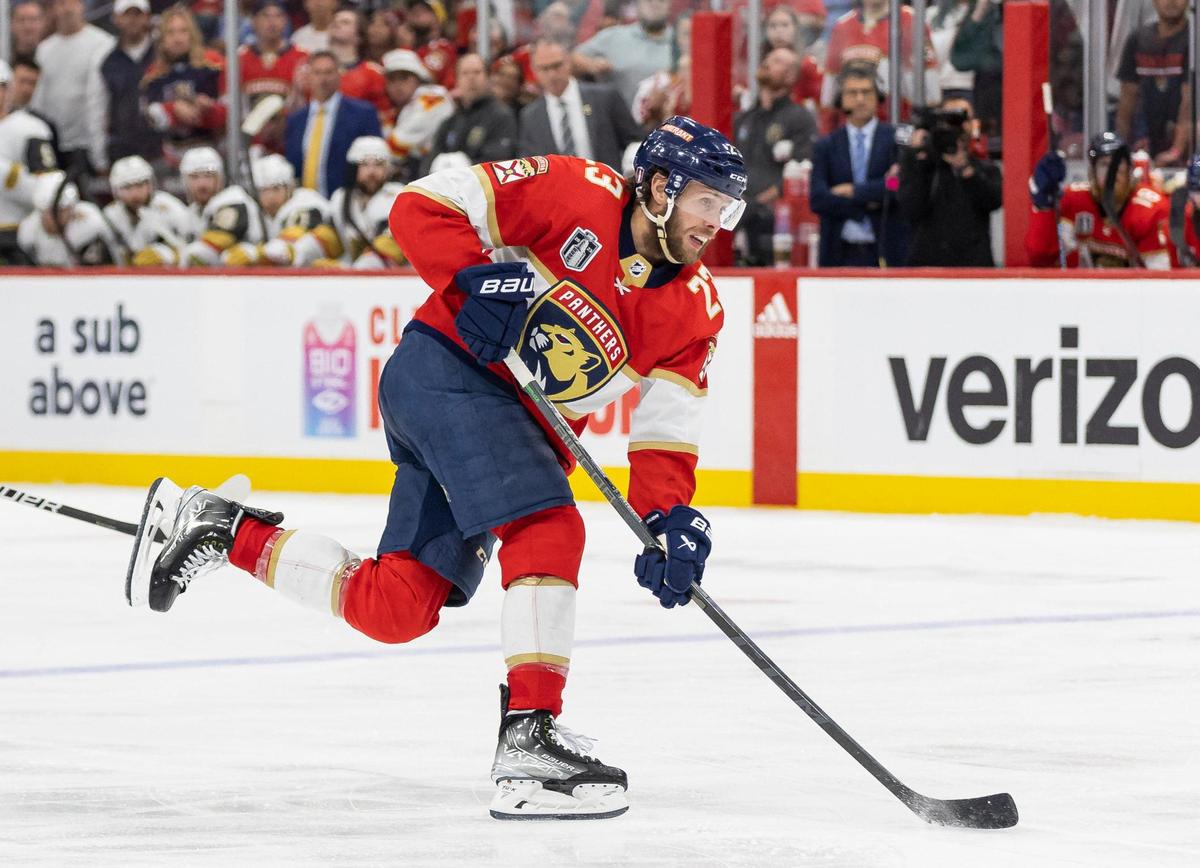 Florida Panthers center Carter Verhaeghe (23) shoots the game winning goal against the Vegas Golden Knights in overtime of Game 3 of the NHL Stanley Cup Final at the FLA Live Arena on Thursday, June 8, 2023, in Sunrise, Fla.